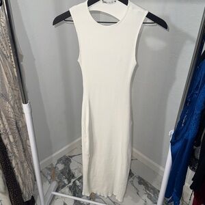 Elegant white Sleeveless Dress with cuts on the back